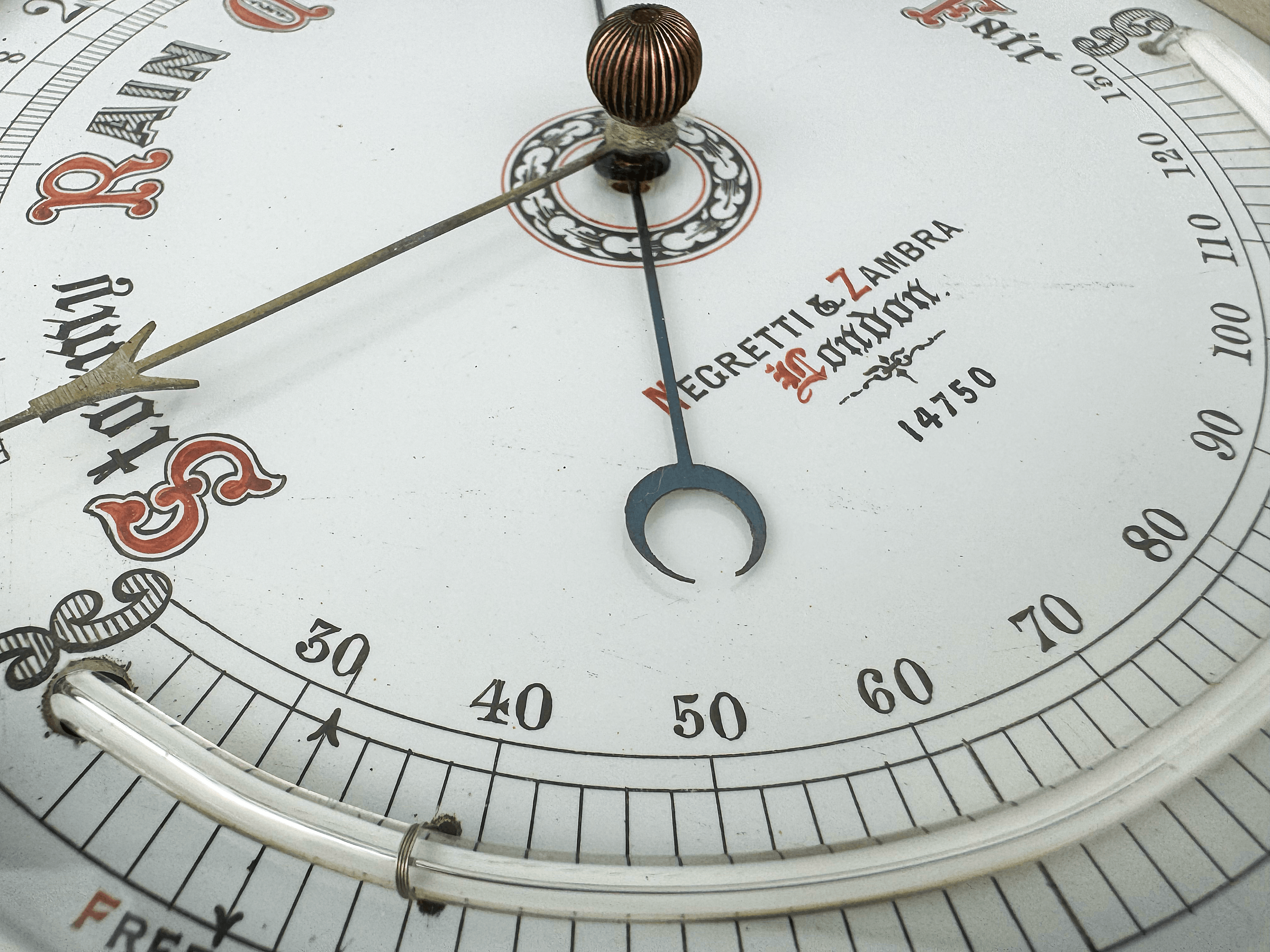 Carved oak round aneroid barometer