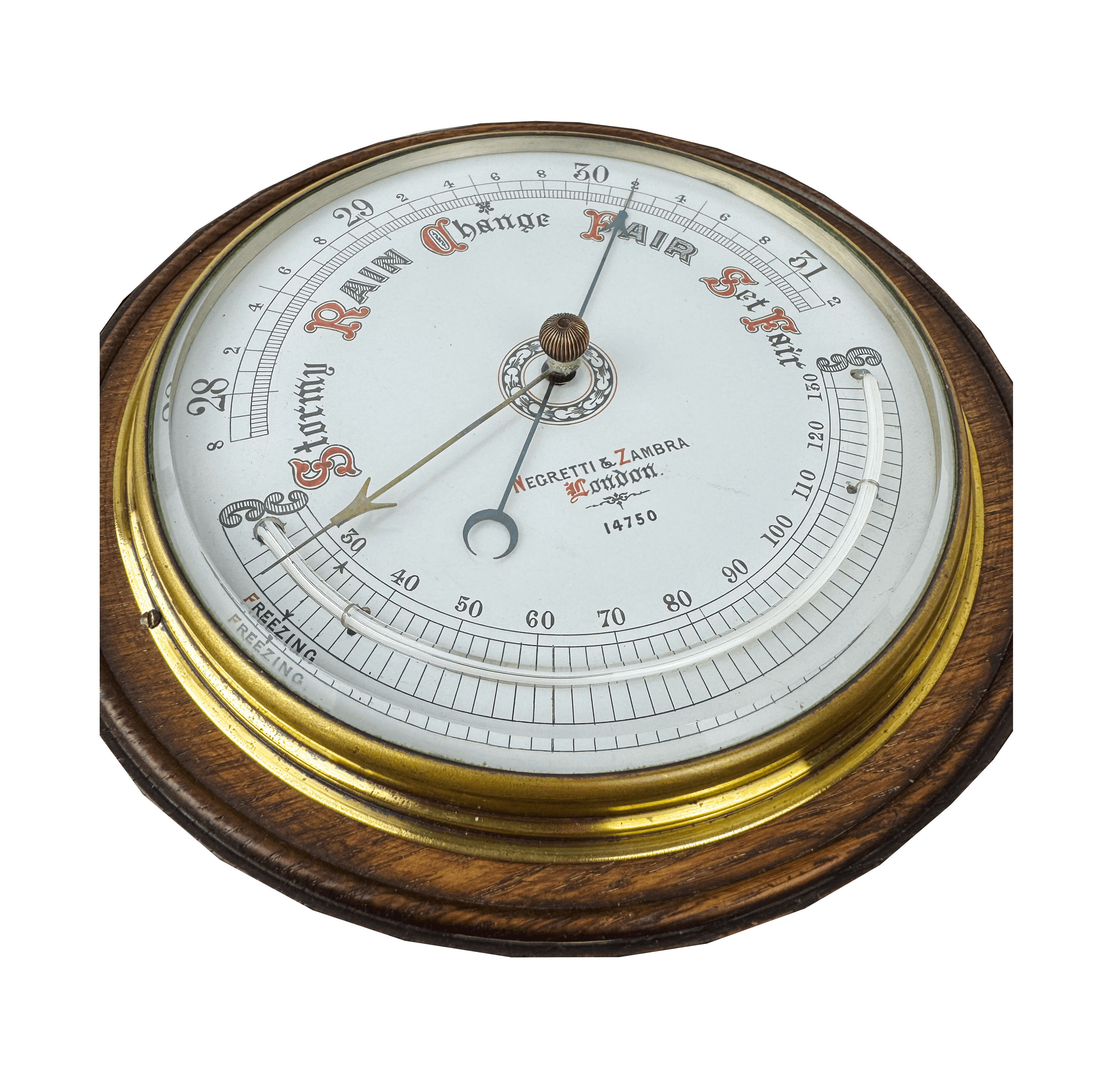 Carved oak round aneroid barometer